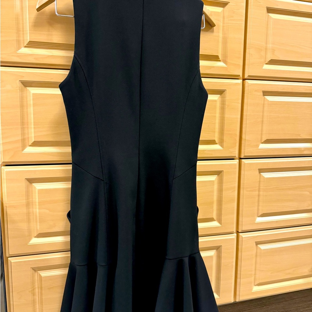 Black wool crepe lined dress with flounce bottom